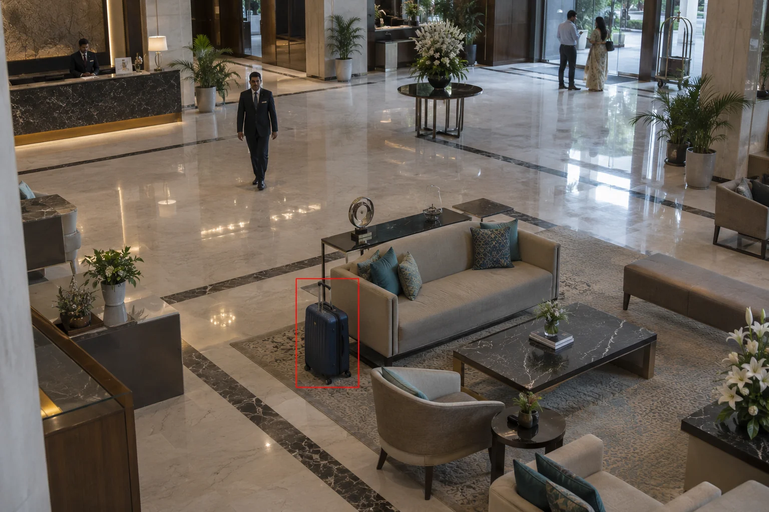 Unattended suitcase near lobby seating
