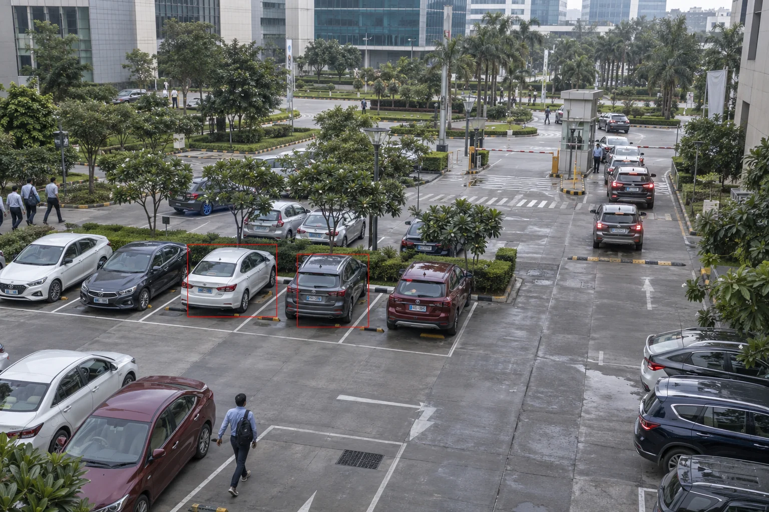 Occupied parking spaces and vehicles queuing at entry